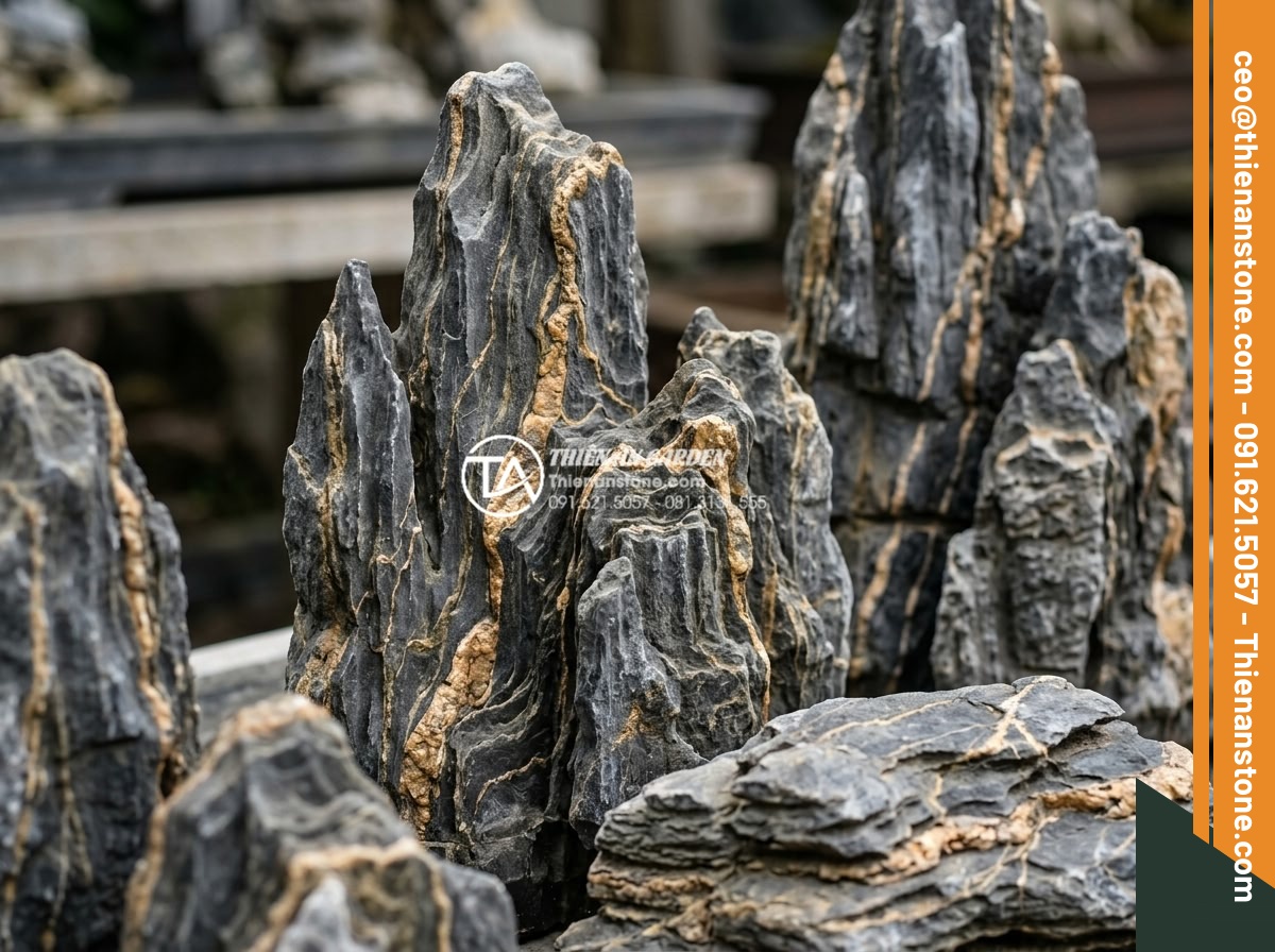 Nghệ thuật sử dụng đá trầm tích trong thiết kế hòn non bộ và tiểu cảnh - Variety of sedimentary rock types including sandstone, limestone, and shale disp