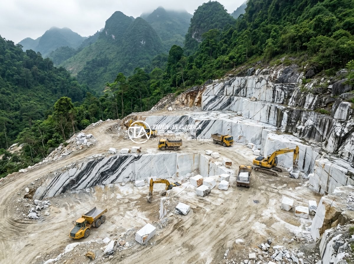 Giá đá tuyết sơn bao nhiêu 1kg? Cập nhật biến động thị trường - Wide angle aerial view of a professional natural stone quarry in mountainous reg