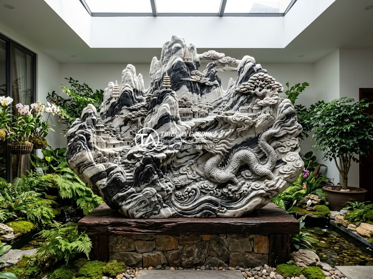 Giải pháp tiểu cảnh sân vườn trong nhà cho nhà phố và nhà ống - Artistic stone carving of traditional Vietnamese landscape used as focal point i