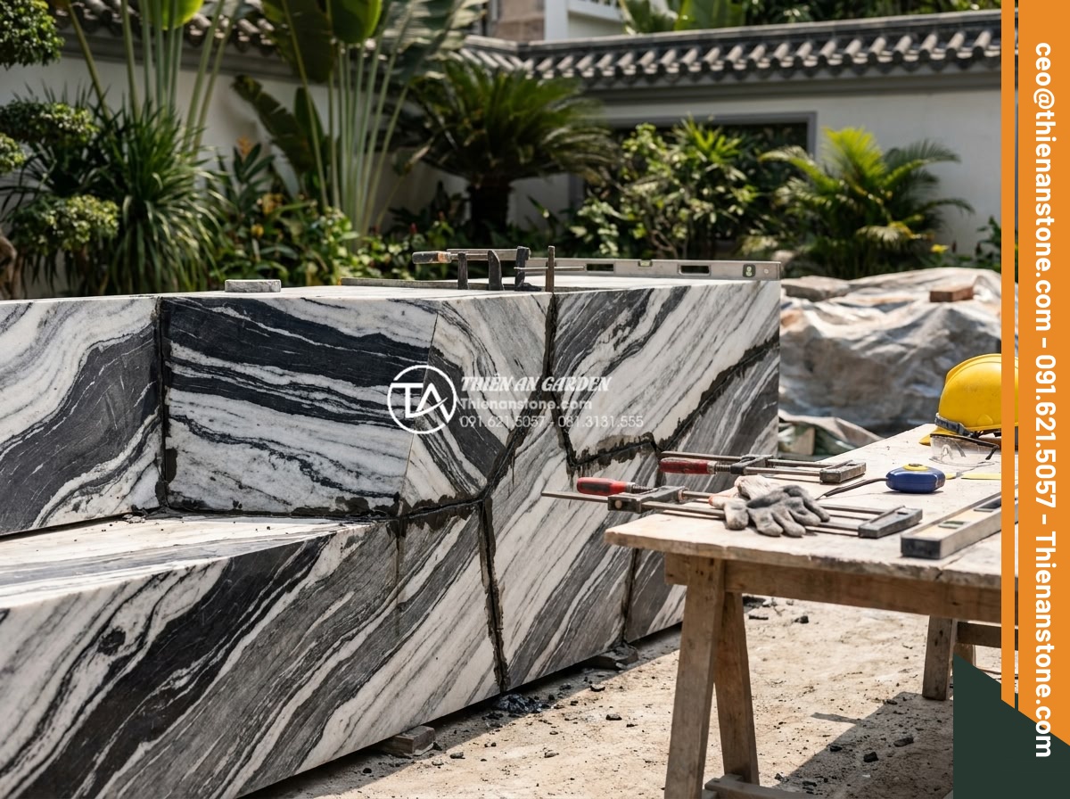Hướng dẫn cách gắn keo và ghép đá tuyết sơn vững chãi nhất - Professional team from Thien An Stone expertly assembling large tuyet son stones