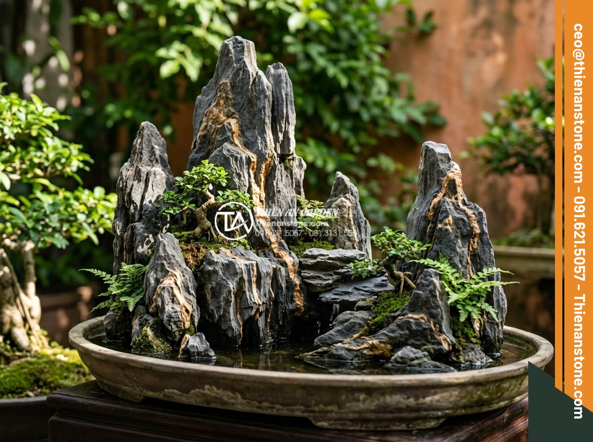 Hướng dẫn tự làm tiểu cảnh sân vườn đơn giản tại nhà - Hình 4 Hướng dẫn tự làm tiểu cảnh sân vườn đơn giản tại nhà - Side view illustration of harmonious stone arrangement creating depth and natura