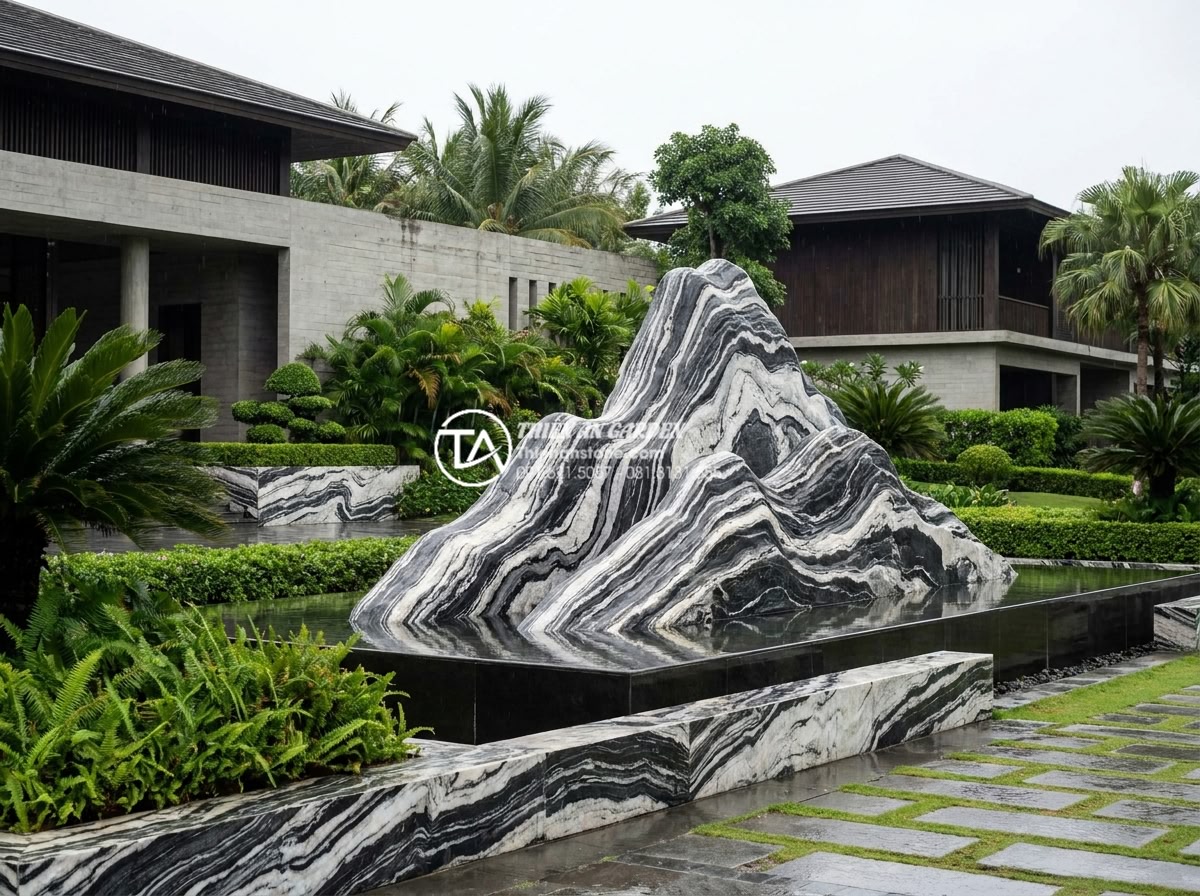 Quy trình khai thác và chế tác đá tuyết sơn tại xưởng điêu khắc - Hình 18 Quy trình khai thác và chế tác đá tuyết sơn tại xưởng điêu khắc - Luxury resort entrance with elegant snow mountain stone sculpture installation a