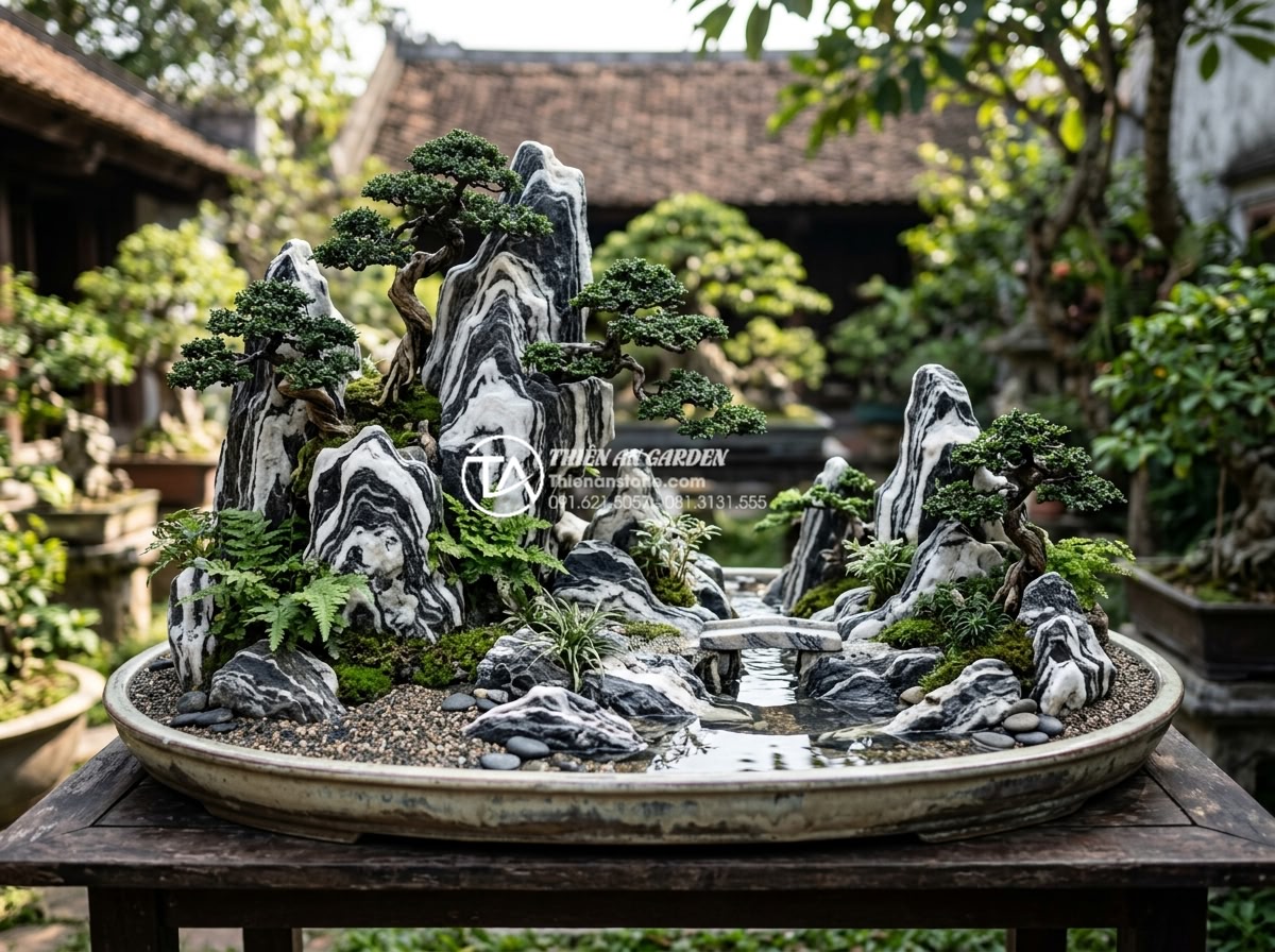 Tiểu cảnh sân vườn đẹp: Xu hướng thiết kế và thi công đẳng cấp 2026 - Detailed stone landscape with artistic rock formations, bonsai integration, and 