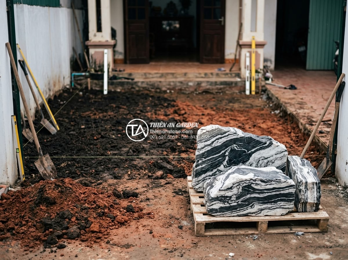 Tiểu cảnh sân vườn trước nhà: Bí quyết tạo ấn tượng đầu tiên - Step-by-step professional installation of natural stone features in small front 