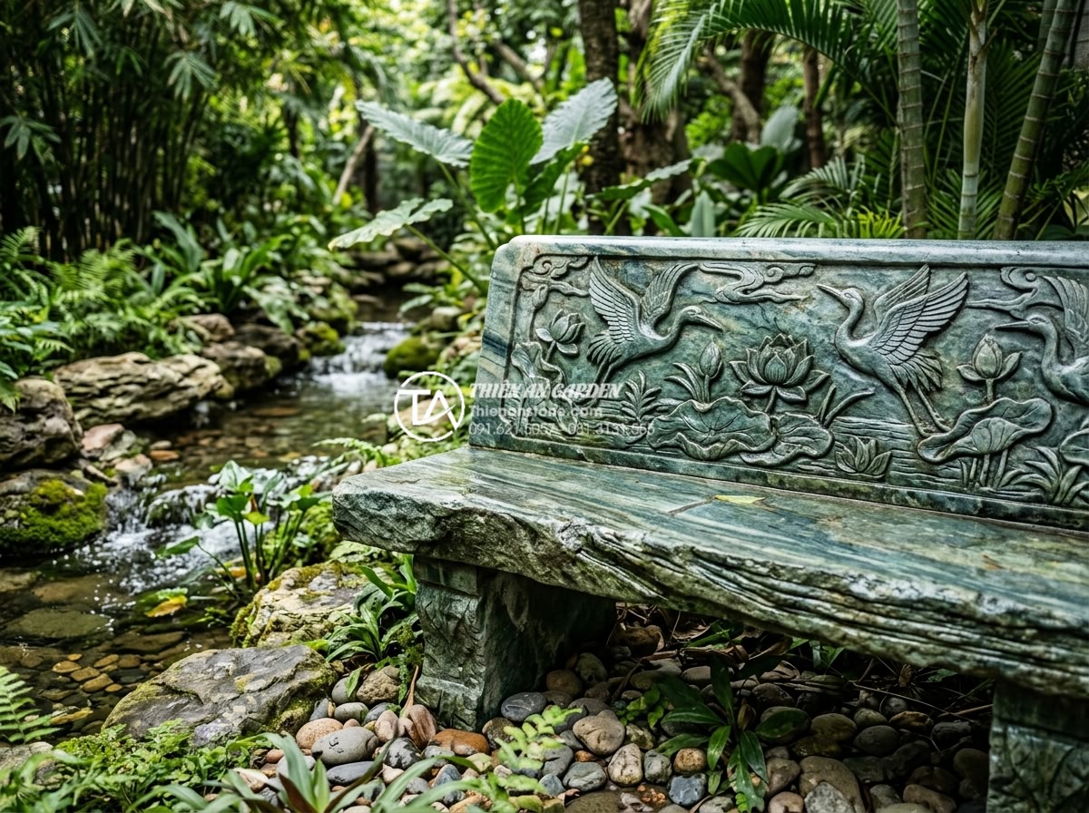 Bố trí ghế đá và khu vực thư giãn bên cạnh tiểu cảnh sân sau - Close-up professional photo of premium Vietnamese granite stone bench with hand-