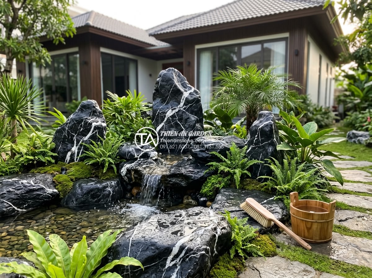 Kinh nghiệm chọn đá cảnh trang trí tiểu cảnh trước nhà bền đẹp theo thời gian - Beautiful maintenance scene of a Vietnamese front yard rock garden: professional