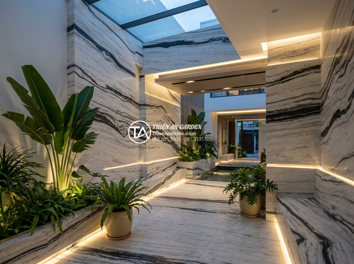 Kinh nghiệm chọn đèn led trang trí giếng trời lung linh vào ban đêm - Hình 18 Kinh nghiệm chọn đèn led trang trí giếng trời lung linh vào ban đêm - Long-term well-maintained LED system illuminating pristine natural stone feature