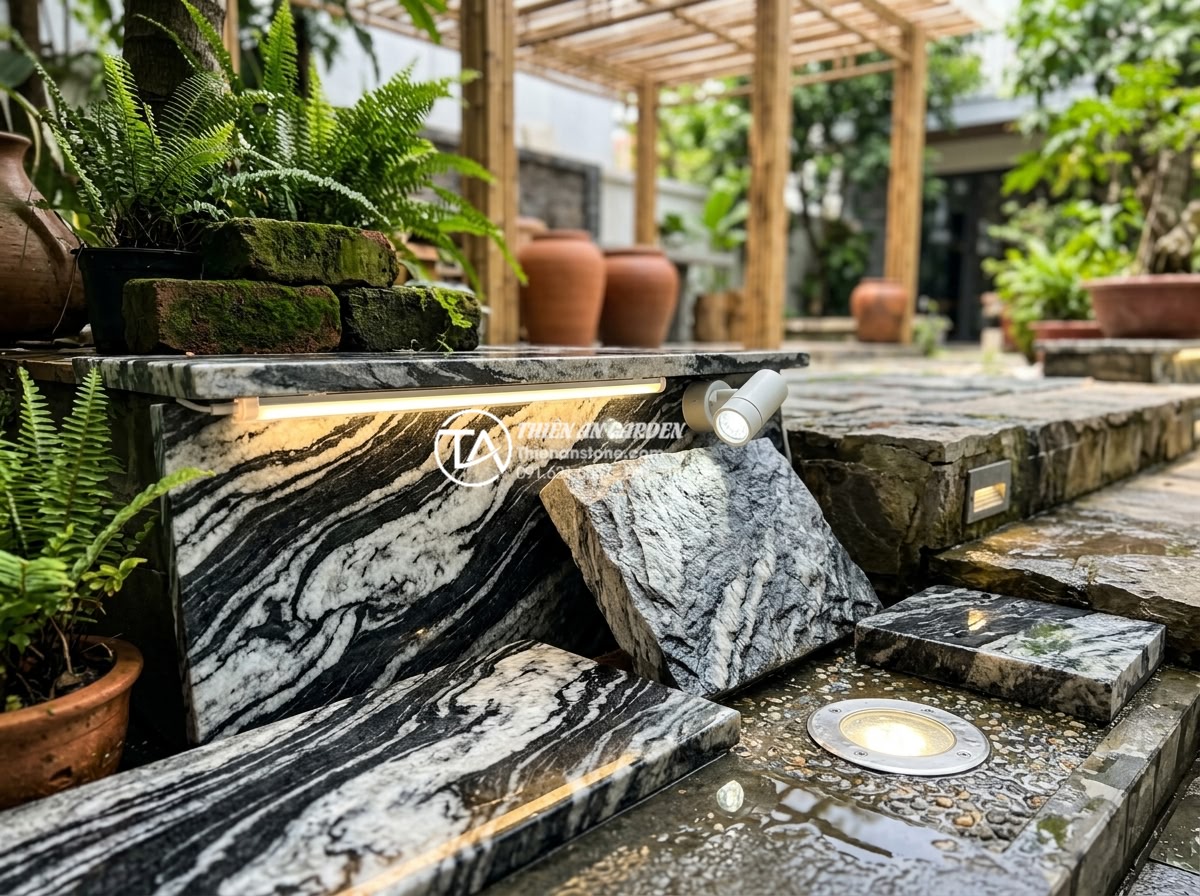 Kinh nghiệm chọn đèn led trang trí giếng trời lung linh vào ban đêm - Hình 4 Kinh nghiệm chọn đèn led trang trí giếng trời lung linh vào ban đêm - Diverse LED lighting options displayed with natural stone samples showing color
