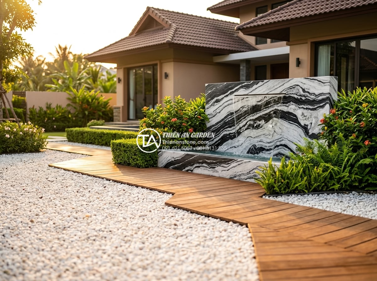 Review 5 loại sỏi quay trang trí tiểu cảnh trước nhà được ưa chuộng nhất - Professional landscape photography of a luxurious Vietnamese front yard featurin