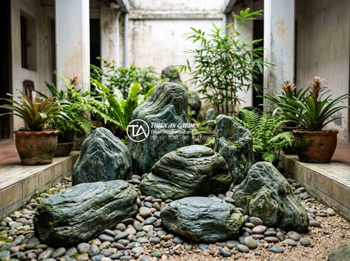 Review các đơn vị thi công tiểu cảnh giếng trời uy tín tại Hà Nội và TP.HCM - Hình 15 Review các đơn vị thi công tiểu cảnh giếng trời uy tín tại Hà Nội và TP.HCM - Variety of premium natural stones including granite marble and basalt arranged f