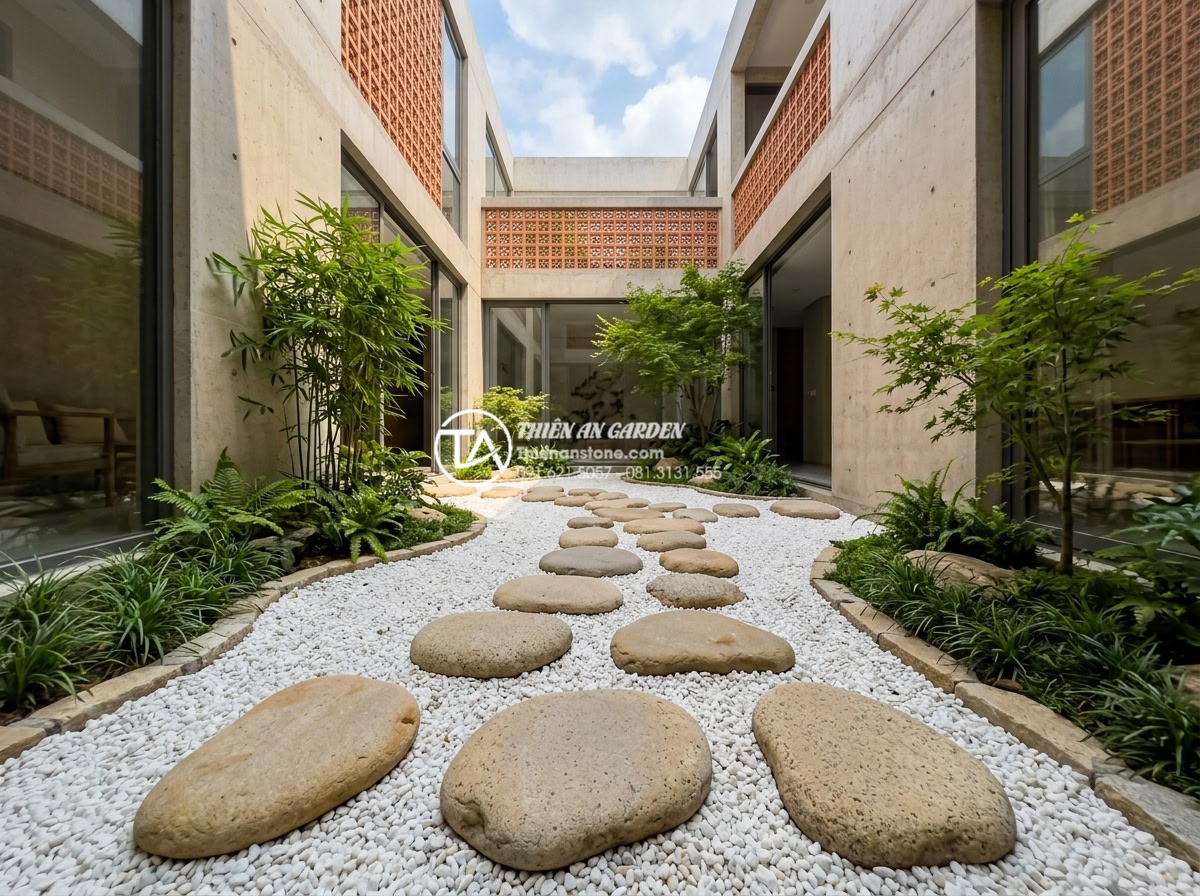 Sử dụng đá bước dặm và sỏi trắng trong trang trí tiểu cảnh giếng trời - Hình 4 Sử dụng đá bước dặm và sỏi trắng trong trang trí tiểu cảnh giếng trời - Wide angle shot of stepping stones leading through white gravel bed in a contemp