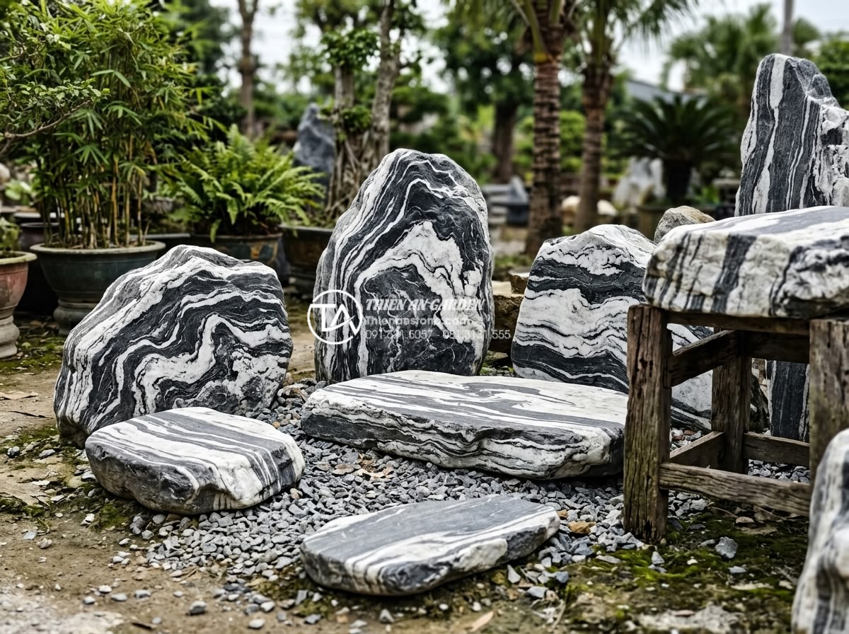 Tại sao nên dùng đá tự nhiên thay vì đá nhân tạo cho tiểu cảnh ngoài trời? - Collection of popular natural stone types like granite basalt marble displayed f