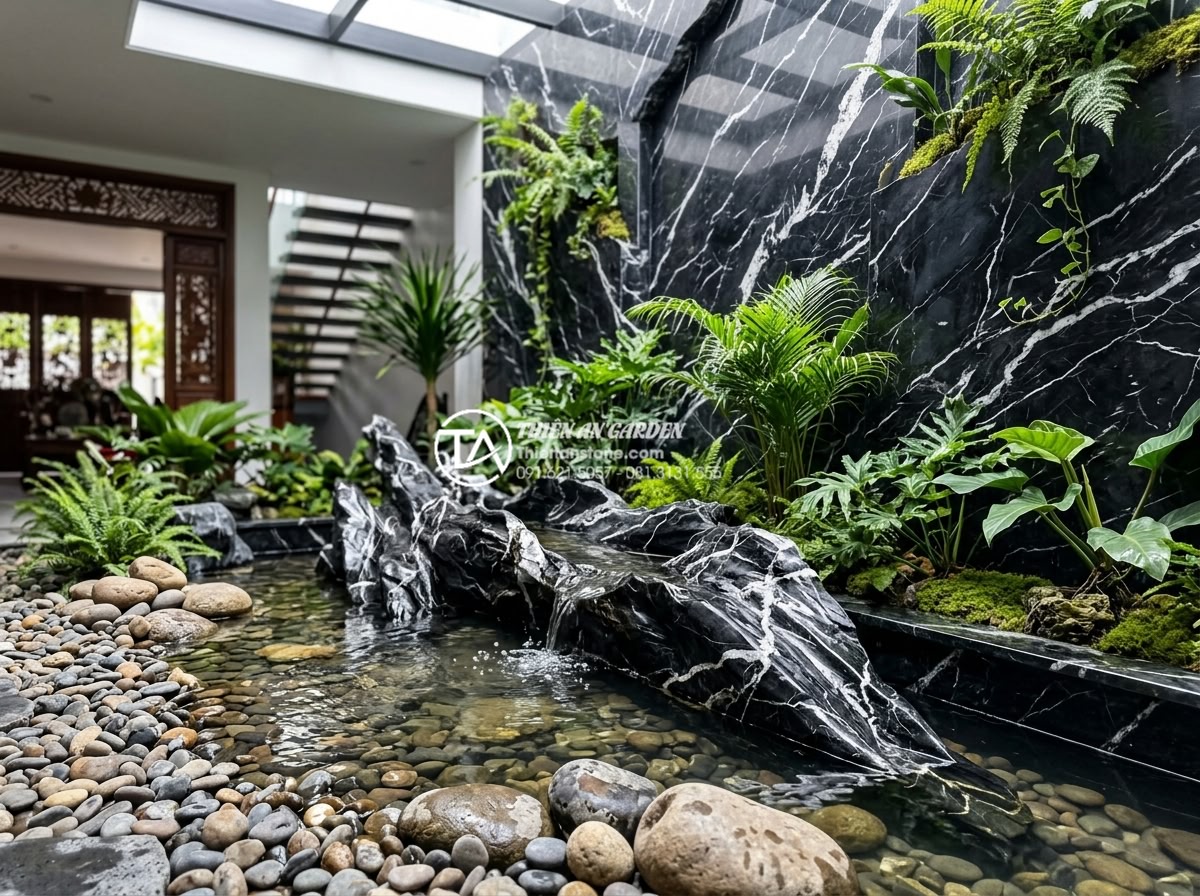 Top 5 loại đá tự nhiên ốp tường giếng trời bền đẹp và sang trọng nhất - Harmonious blend of stone cladding, pebbles and water features in beautiful atri