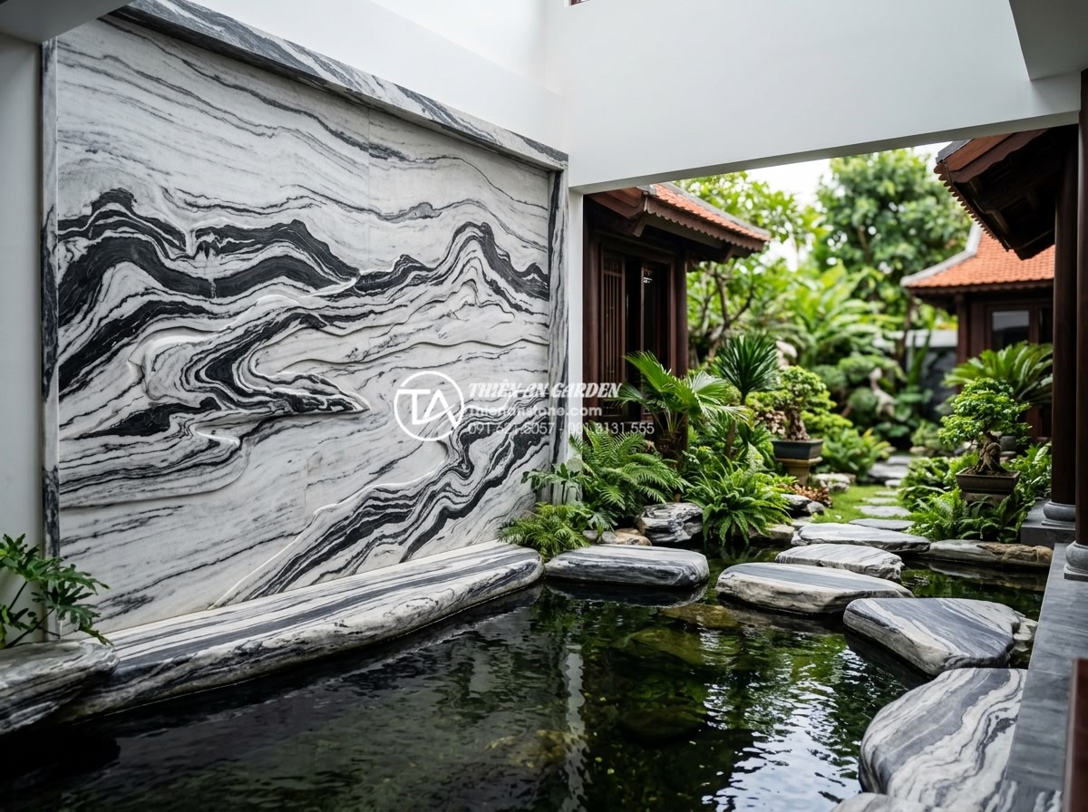 Ứng dụng tranh đá ốp tường giếng trời tạo điểm nhấn nghệ thuật - Hình 9 Ứng dụng tranh đá ốp tường giếng trời tạo điểm nhấn nghệ thuật - Stone mural integrated into luxury villa atrium overlooking landscaped garden wi