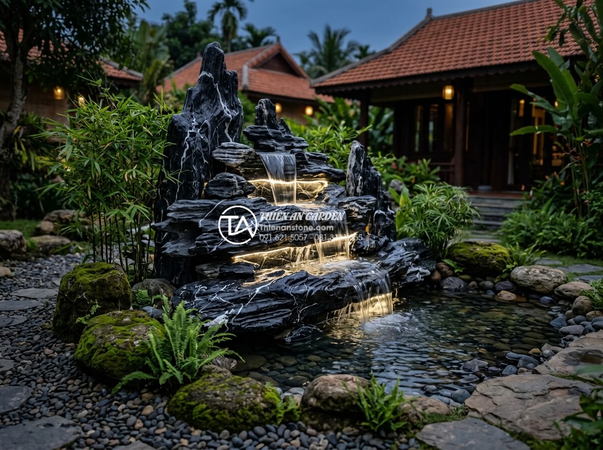 Cách thiết kế hệ thống lọc nước cho tiểu cảnh thác nước luôn trong xanh - High-resolution photo of a luxurious natural stone waterfall feature in a resort