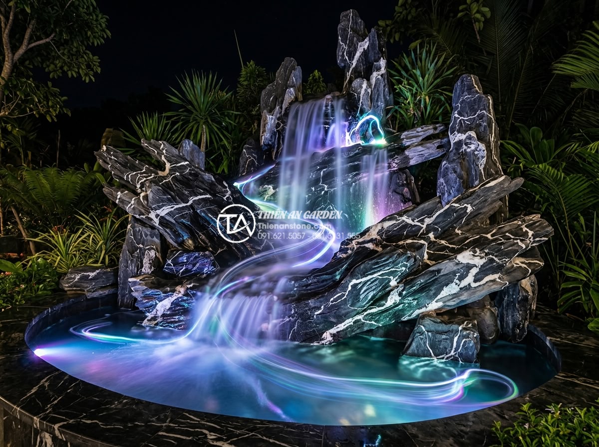 Hệ thống đèn led âm nước: Cách tạo hiệu ứng ánh sáng huyền ảo cho thác nước - Artistic long exposure photograph of a stone waterfall at night with underwater 