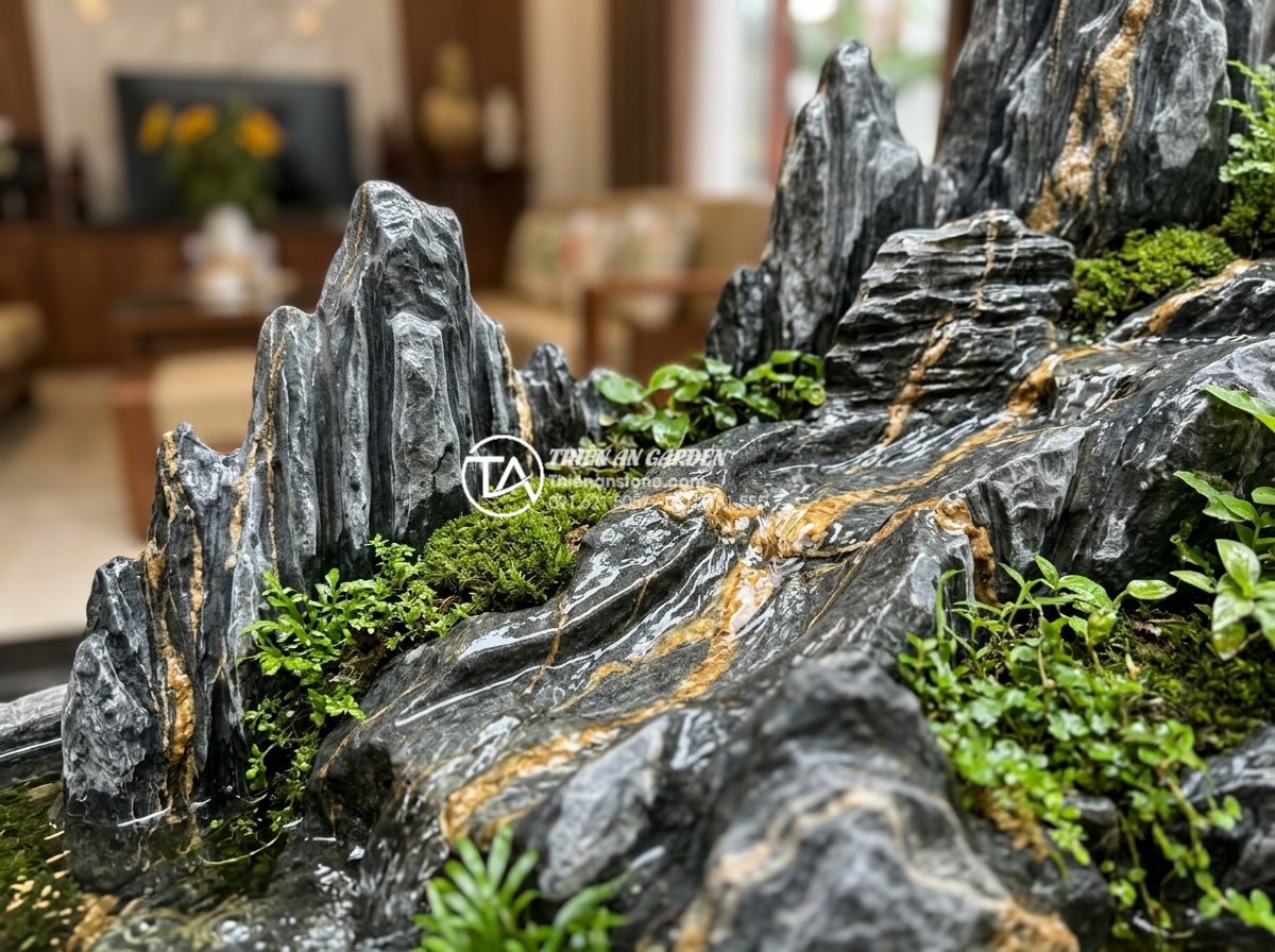Mẫu tiểu cảnh thác nước gầm cầu thang: Mang sinh khí vào góc chết ngôi nhà - Close-up detailed view of hand-carved natural stone waterfall elements with crys