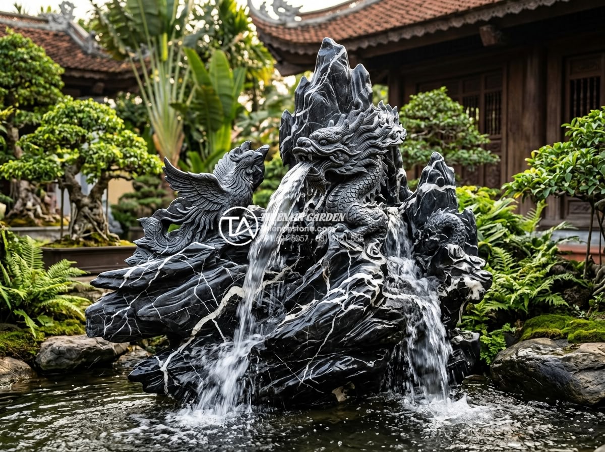 Top 10 mẫu non bộ kết hợp thác nước phong thủy cực phẩm cho biệt thự - Exquisite hand-carved natural stone non-bo featuring intricate dragon and phoeni