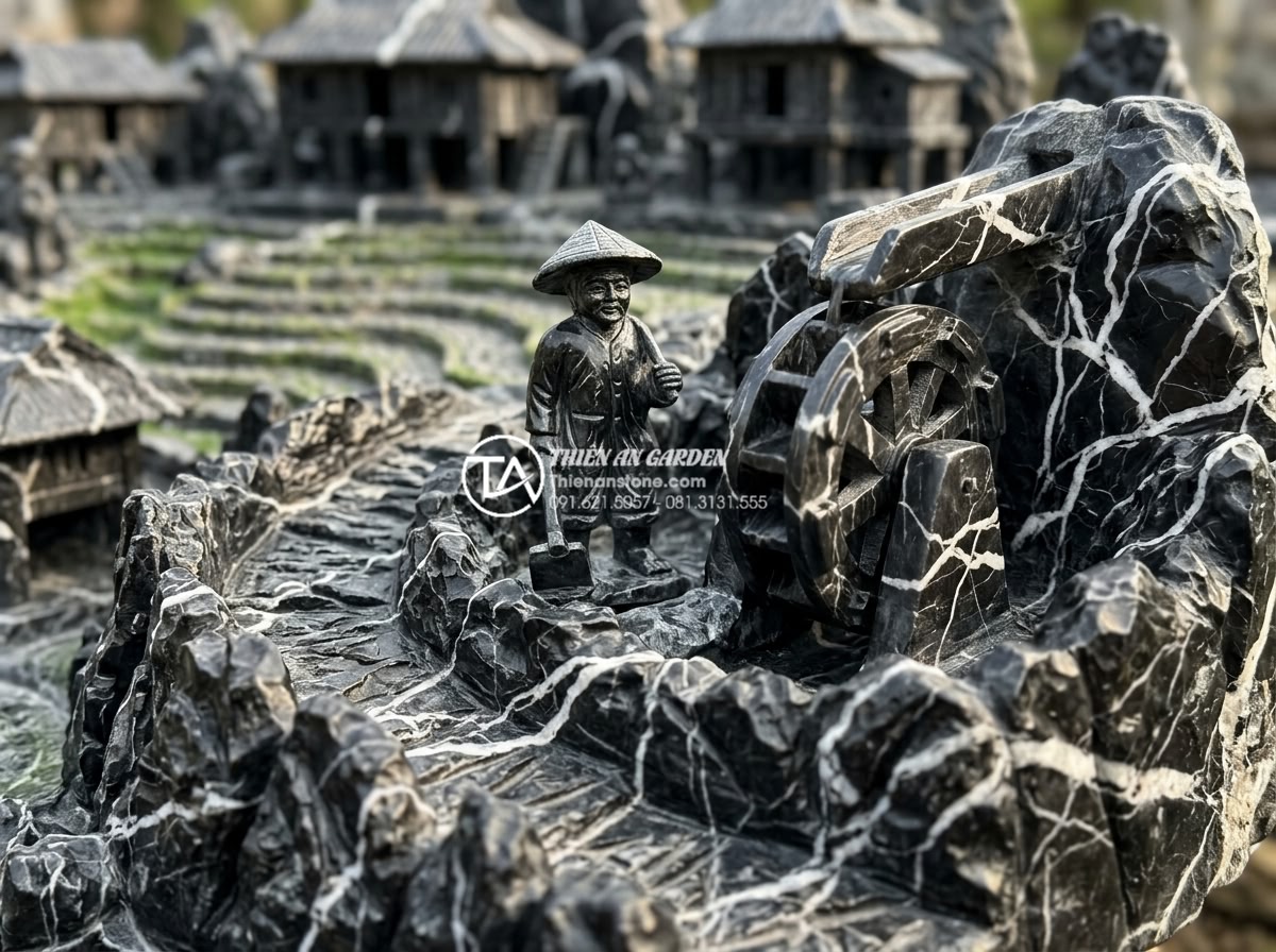 Báo giá thi công tiểu cảnh làng quê Bắc Bộ trọn gói mới nhất 2026 - Close-up of hand-carved natural stone details in Northern Vietnamese village min