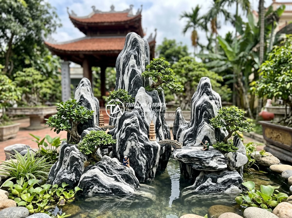 Case Study: Cải tạo sân vườn 20m2 với tiểu cảnh đá cuội từ A-Z - Team photo of Đá Cảnh Thiên An expert landscapers standing proudly next to the f