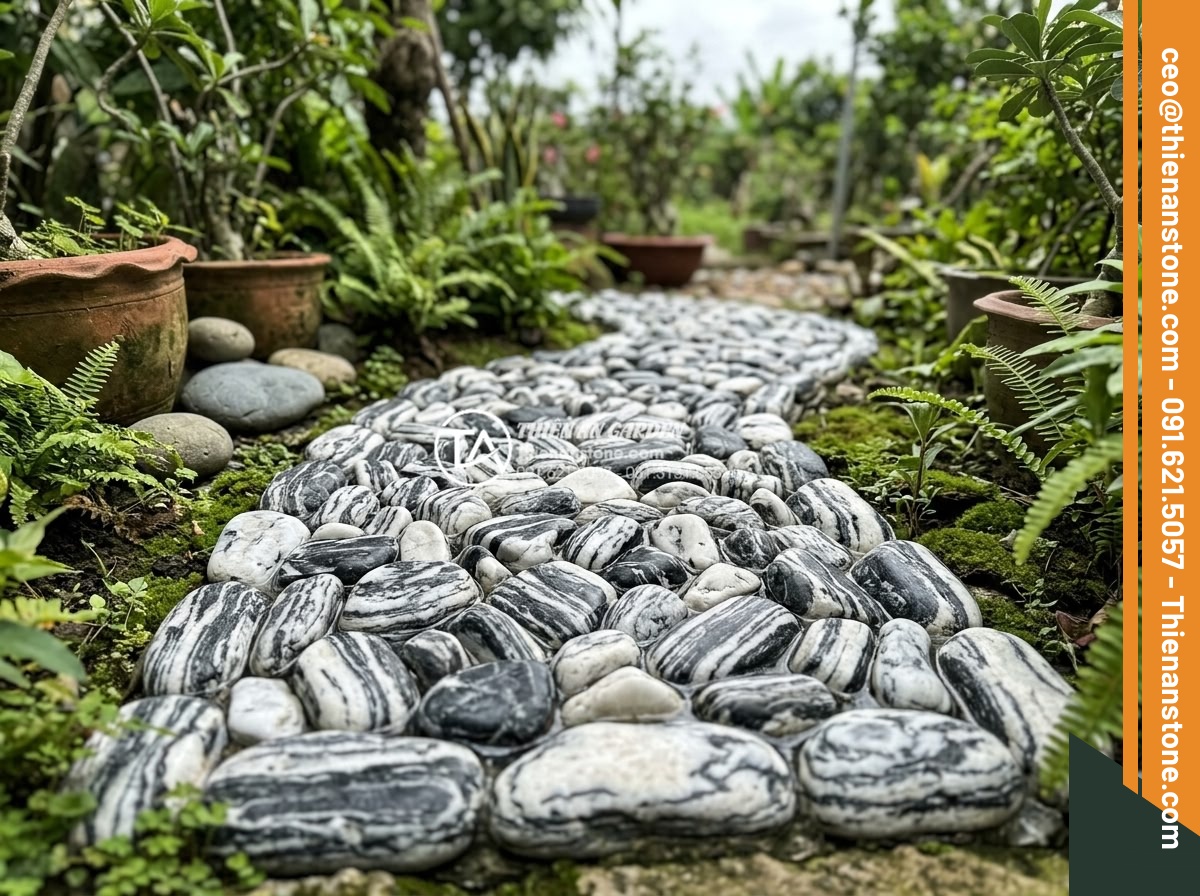 Hướng dẫn dán đá cuội làm tiểu cảnh bằng keo chuyên dụng siêu chắc - Completed basic glued pebble stone arrangement showing clean joints and strong b