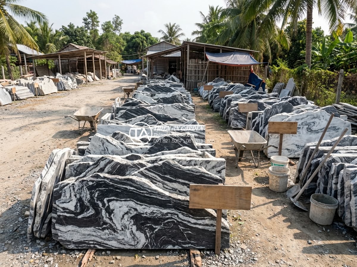 Phân biệt đá cuội suối, đá cuội biển và đá cuội đồi trong thi công - Wide angle photograph of a professional stone supplier yard in Vietnam displayin