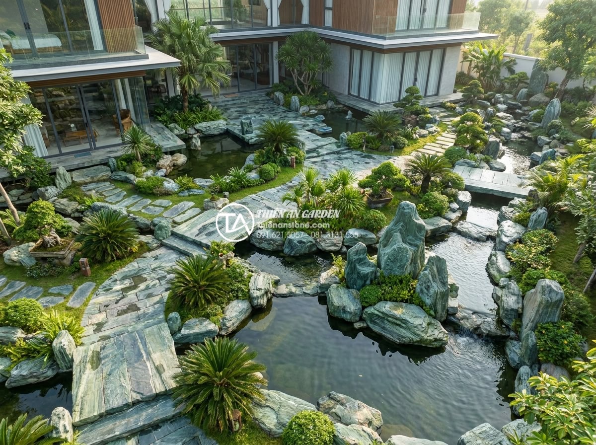 Top 50+ mẫu tiểu cảnh đá cuội đẹp dẫn đầu xu hướng trang trí 2026 - Grand photorealistic image of a luxury villa estate with expansive pebble stone 