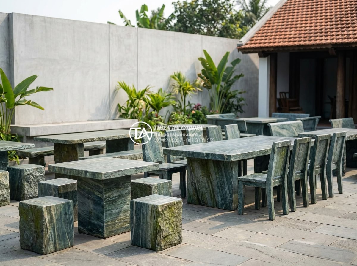Giá bộ bàn ghế đá hoa cương bao nhiêu tiền? Bảng giá chi tiết tại xưởng - Hình 3 Giá bộ bàn ghế đá hoa cương bao nhiêu tiền? Bảng giá chi tiết tại xưởng - Professional product photography of multiple granite stone table and chair sets