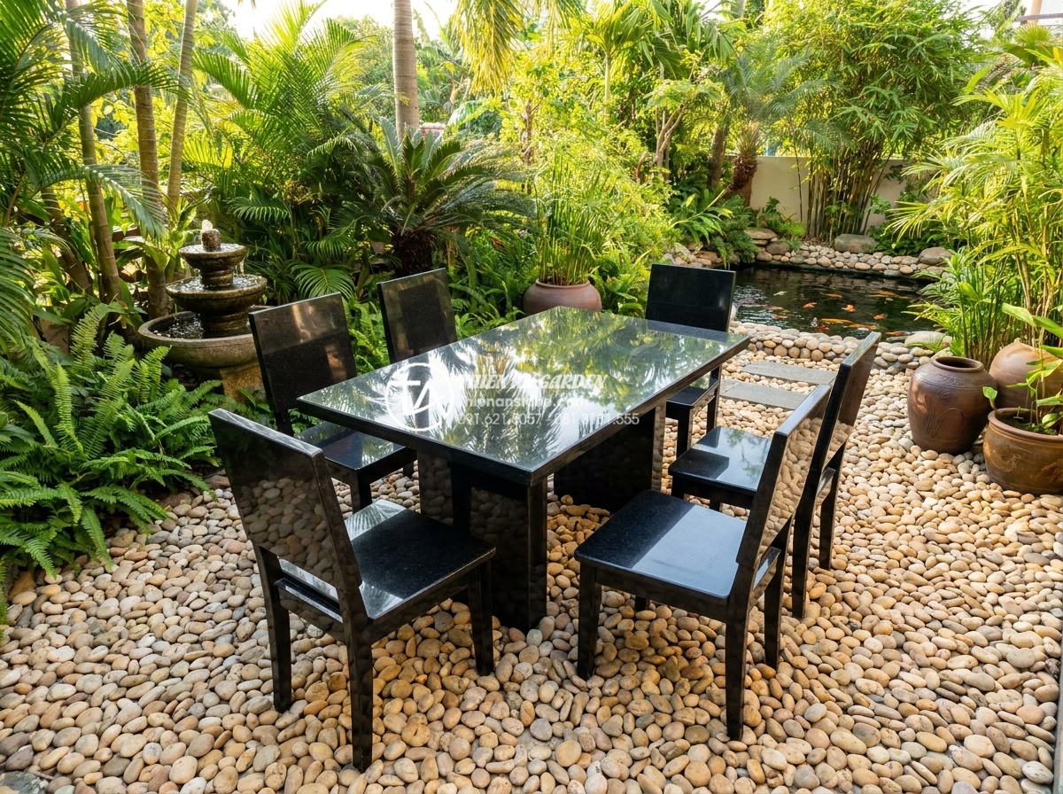 Hướng dẫn vệ sinh và bảo dưỡng bàn ghế đá hoa cương luôn sáng bóng như mới - Hình 1 Hướng dẫn vệ sinh và bảo dưỡng bàn ghế đá hoa cương luôn sáng bóng như mới - Professional wide-angle photograph of a luxurious polished black granite outdoor