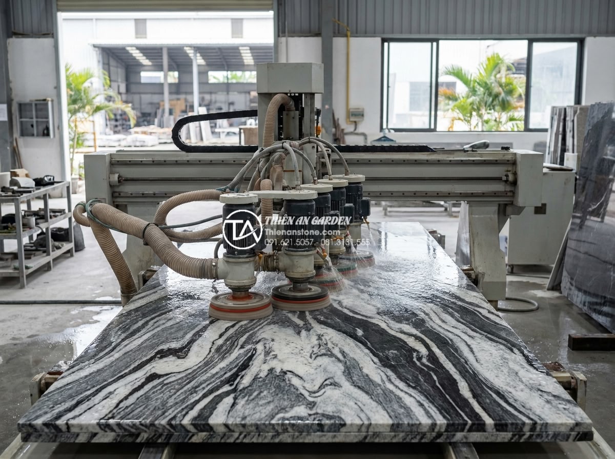Quy trình chế tác bàn ghế đá nguyên khối từ khối đá thô đến tác phẩm hoàn thiện - Hình 13 Quy trình chế tác bàn ghế đá nguyên khối từ khối đá thô đến tác phẩm hoàn thiện - Automated multi-head stone polishing machine applying progressive diamond abrasi