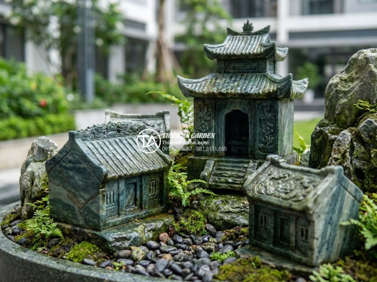 Top 15 mẫu tiểu cảnh làng quê Bắc Bộ hiện đại cho chung cư cao cấp - Hình 7 Top 15 mẫu tiểu cảnh làng quê Bắc Bộ hiện đại cho chung cư cao cấp - Artistic close-up of hand-carved sandstone and granite temple and village hall m