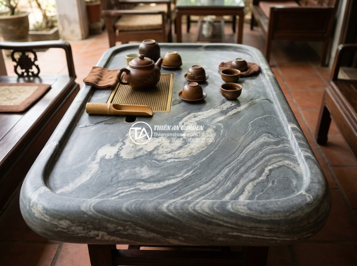 5 sai lầm nghiêm trọng khi mua bàn trà bằng đá tự nhiên bạn cần tránh - Long-term usage photo showing a natural stone tea table that has been beautifull