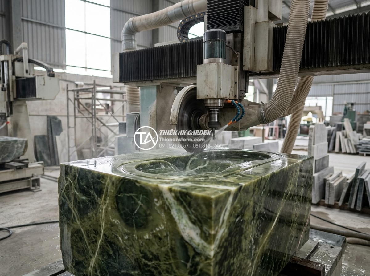 Bàn Đá Lavabo Cao Cấp - Lựa Chọn Hàng Đầu Cho Biệt Thự Và Resort - Detailed view of professional stone craftsmen using CNC machine to carve a large