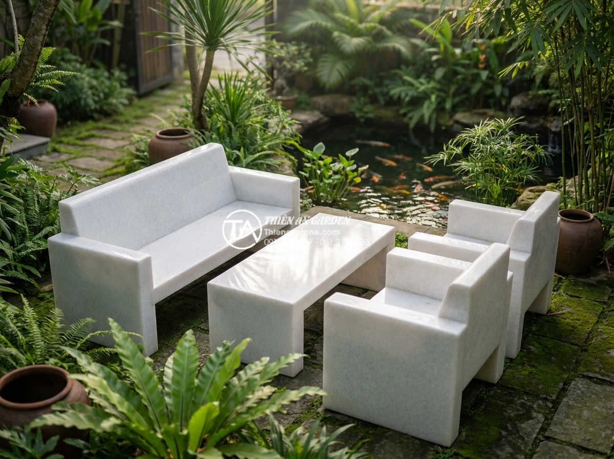 Bàn ghế đá tự nhiên hợp mệnh Kim: Nên chọn loại đá và màu sắc nào? - Hình 1 Bàn ghế đá tự nhiên hợp mệnh Kim: Nên chọn loại đá và màu sắc nào? - High-resolution professional photograph of a luxurious white marble bench and ma