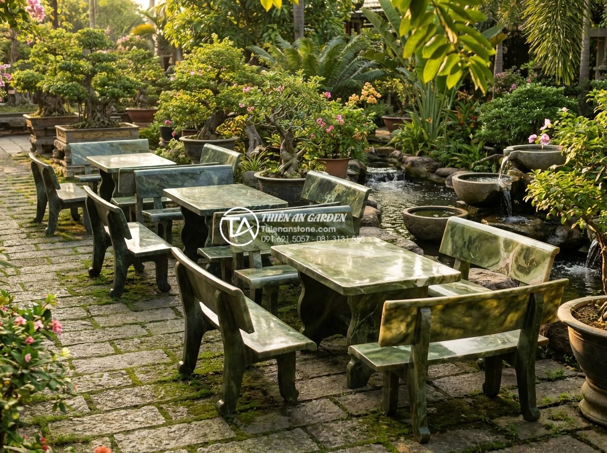 Bàn ghế đá tự nhiên hợp mệnh Kim: Nên chọn loại đá và màu sắc nào? - Hình 4 Bàn ghế đá tự nhiên hợp mệnh Kim: Nên chọn loại đá và màu sắc nào? - Elegant outdoor scene featuring five different natural stone bench and chair set