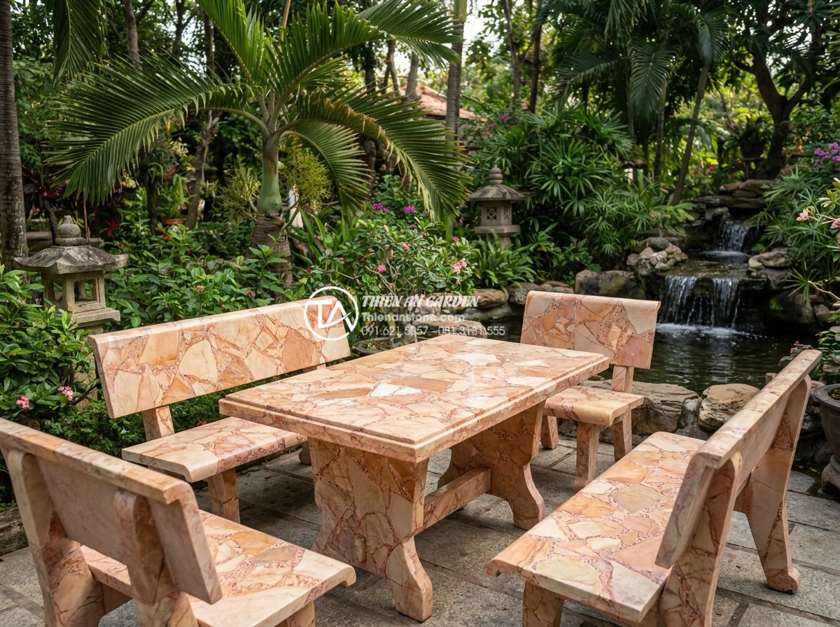 Bàn ghế đá tự nhiên hợp mệnh Thổ: Tăng cường vượng khí cho gia chủ - Hình 4 Bàn ghế đá tự nhiên hợp mệnh Thổ: Tăng cường vượng khí cho gia chủ - Wide angle realistic photo of a complete natural stone patio furniture set in wa