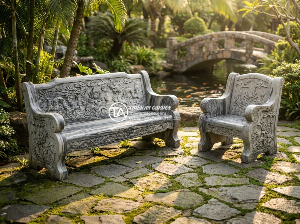 Bàn ghế đá tự nhiên hợp mệnh Thổ: Tăng cường vượng khí cho gia chủ - Hình 5 Bàn ghế đá tự nhiên hợp mệnh Thổ: Tăng cường vượng khí cho gia chủ - Artistic professional photograph of intricately carved natural stone bench and m