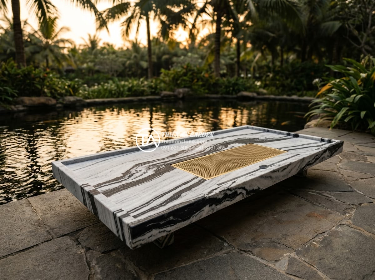 Bàn trà bằng đá tự nhiên: Xu hướng kiến trúc sân vườn đẳng cấp 2026 - Photorealistic image of a luxurious natural stone tea table made from Vietnamese