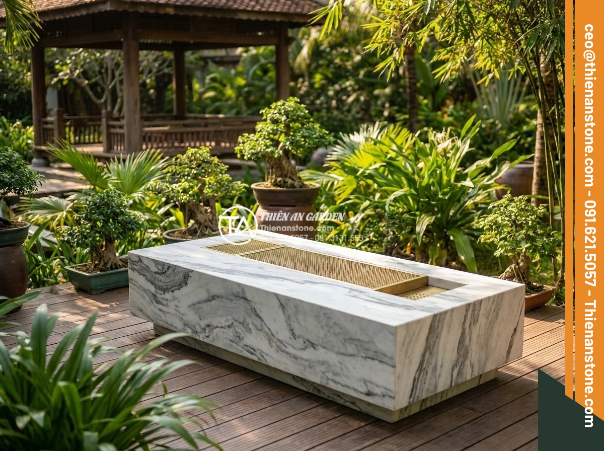 Bàn trà bằng đá tự nhiên: Xu hướng kiến trúc sân vườn đẳng cấp 2026 - Hình 10 Bàn trà bằng đá tự nhiên: Xu hướng kiến trúc sân vườn đẳng cấp 2026 - Professional team photo of Đá Cảnh Thiên An experts standing proudly next to a c