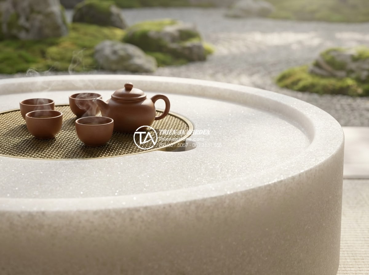 Bàn trà đá tuyết sơn nguyên khối: Vẻ đẹp độc bản từ những đường vân - Serene close-up of a snow mountain stone tea table with a traditional Vietnamese