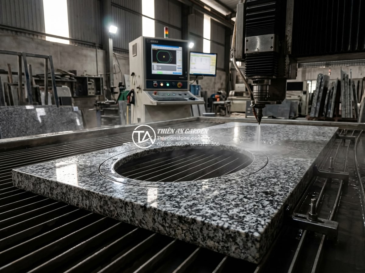 Cách Khoét Lỗ Bàn Đá Chậu Rửa Mặt: Checklist Kỹ Thuật Cho Thợ Thi Công - Industrial CNC waterjet cutting machine precisely cutting oval sink hole in thic
