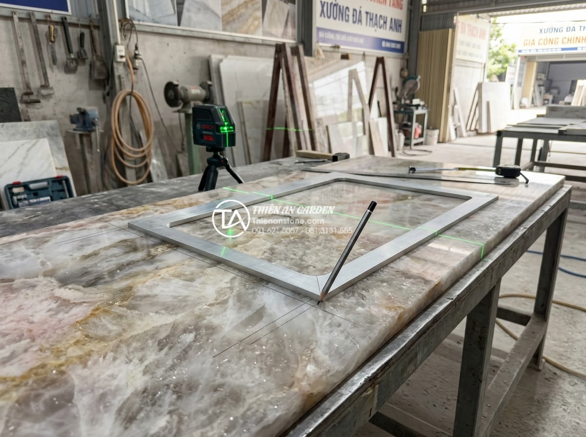 Cách Khoét Lỗ Bàn Đá Chậu Rửa Mặt: Checklist Kỹ Thuật Cho Thợ Thi Công - Professional stone fabricator measuring and marking sink cutout position on larg