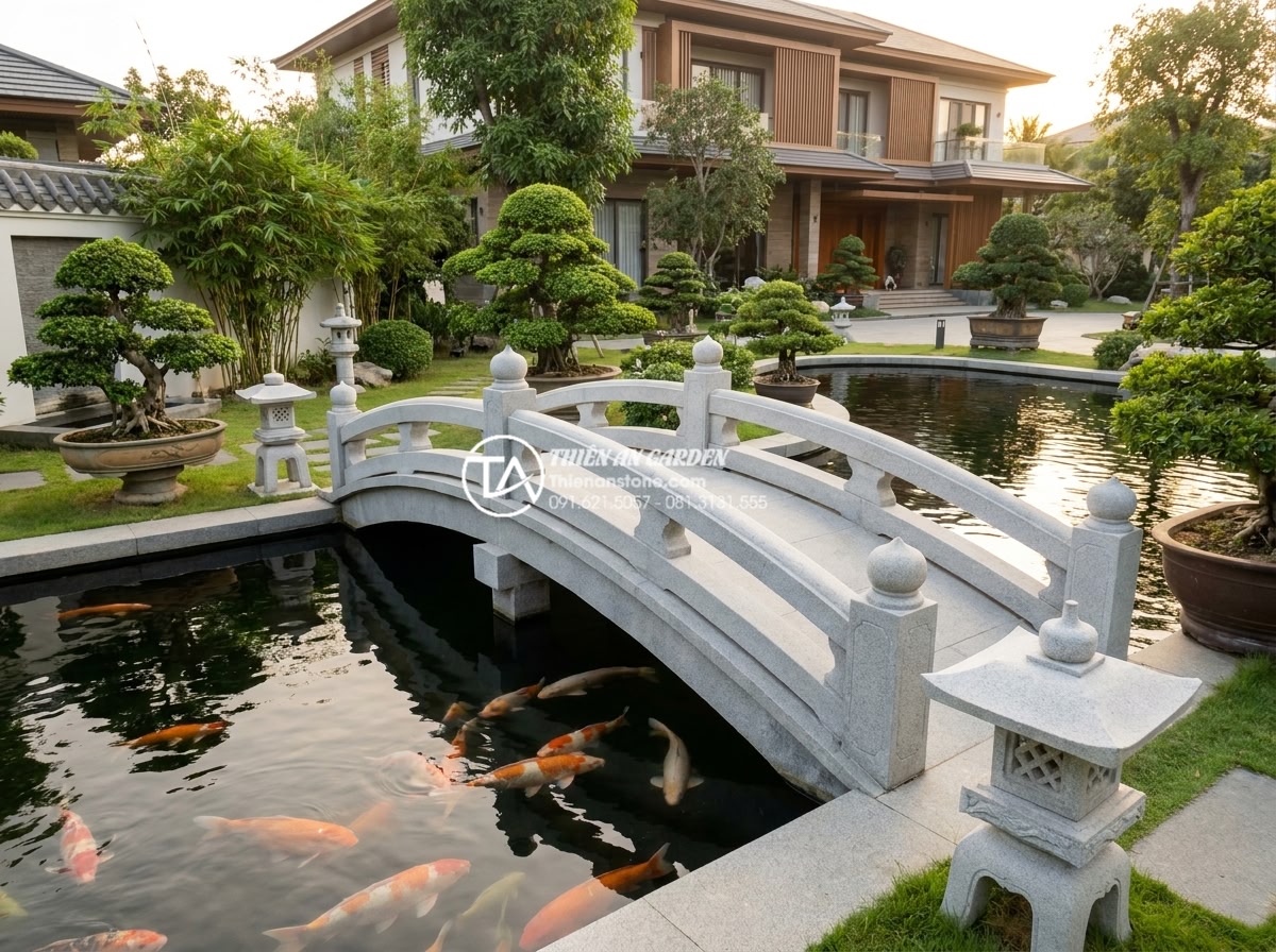 Cầu sân vườn Nhật Bản: Nghệ thuật sắp đặt và triết lý Zen trong cảnh quan - Hình 6 Cầu sân vườn Nhật Bản: Nghệ thuật sắp đặt và triết lý Zen trong cảnh quan - Luxury Vietnamese villa garden featuring elegant Japanese stone bridge spanning