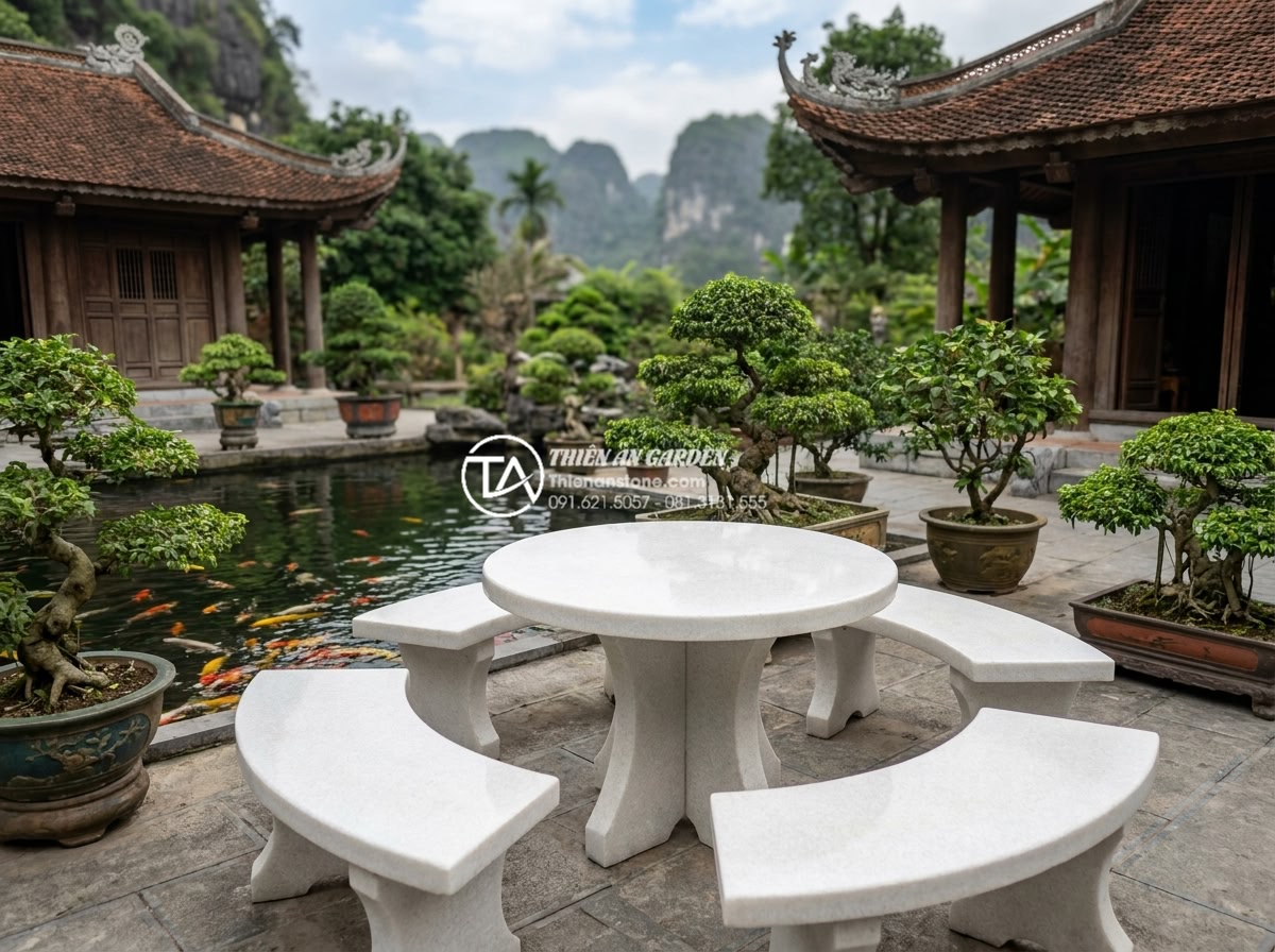 Địa chỉ mua bàn ghế đá tự nhiên uy tín tại Ninh Bình và Thanh Hóa - Hình 10 Địa chỉ mua bàn ghế đá tự nhiên uy tín tại Ninh Bình và Thanh Hóa - Beautiful final installation of natural stone garden furniture set in a serene V