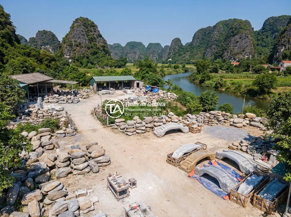 Địa chỉ xưởng điêu khắc cầu đá mỹ nghệ uy tín, giá gốc tại Ninh Bình - Hình 3 Địa chỉ xưởng điêu khắc cầu đá mỹ nghệ uy tín, giá gốc tại Ninh Bình - Aerial drone shot of stone carving workshops scattered across the limestone moun