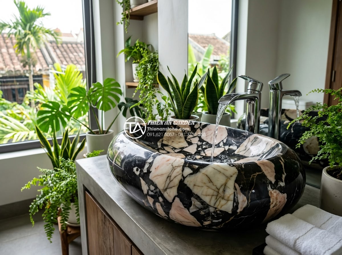 Kinh Nghiệm Mua Lavabo Đá Cuội Tại Hà Nội: Địa Chỉ Uy Tín Và Giá Tận Xưởng - Modern Hanoi bathroom interior featuring a large pebble stone lavabo with waterf