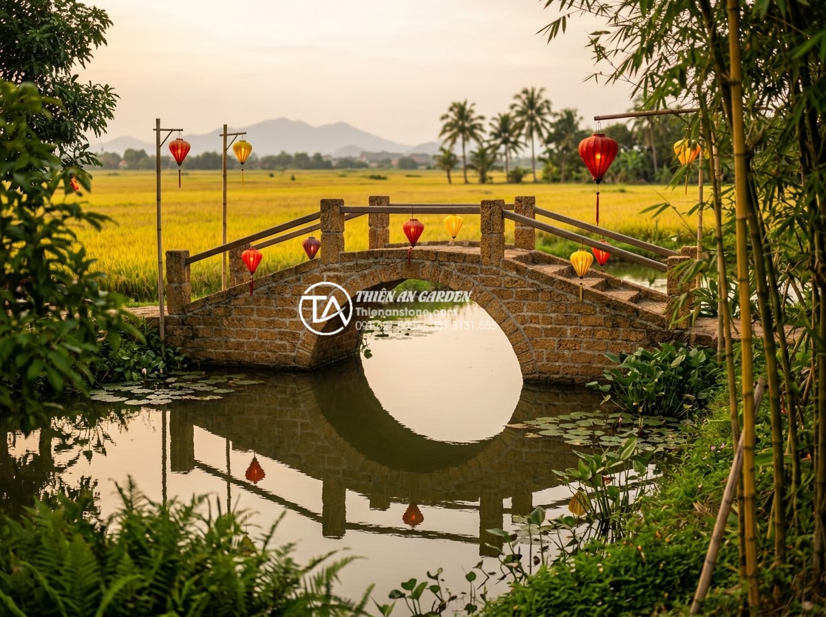 Mẹo chọn màu sắc cầu đá hợp mệnh gia chủ theo quy luật Ngũ Hành - Warm earthy yellow and beige laterite stone garden bridge in a classic Vietnames