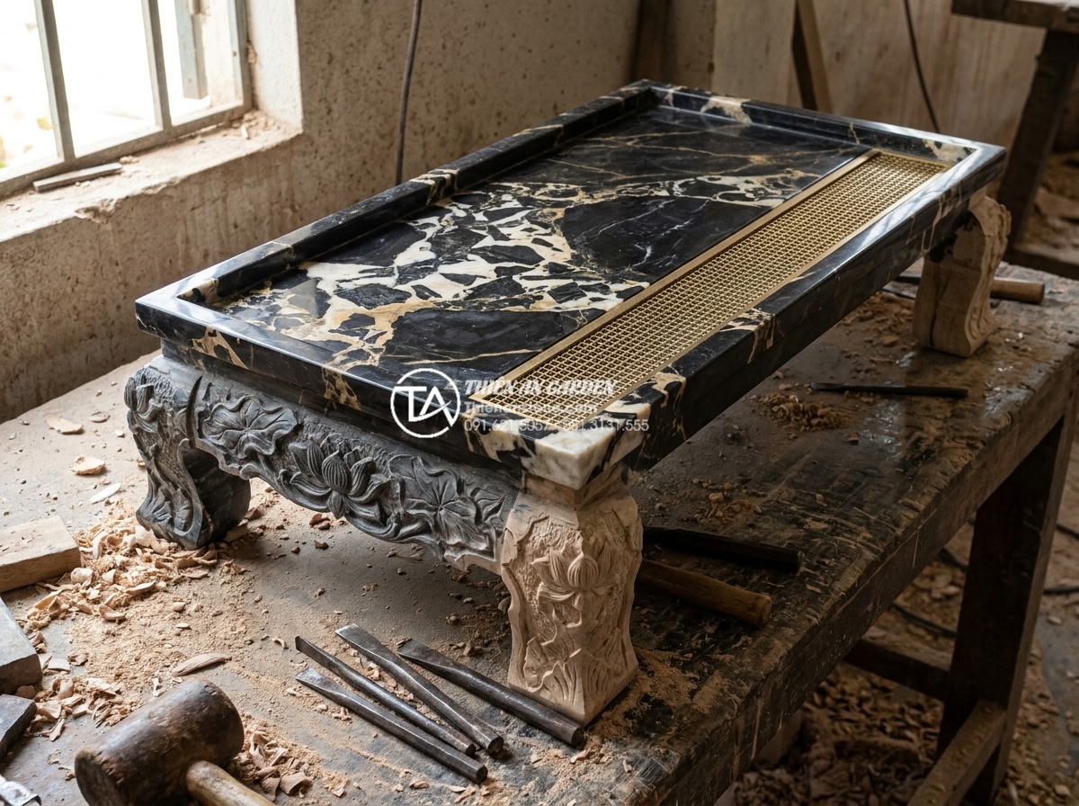 Nghệ thuật thưởng trà với bàn trà đạo bằng đá: Sự giao hòa giữa tĩnh và động - Hình 10 Nghệ thuật thưởng trà với bàn trà đạo bằng đá: Sự giao hòa giữa tĩnh và động - Master craftsman hand-carving intricate lotus patterns on natural stone tea tabl