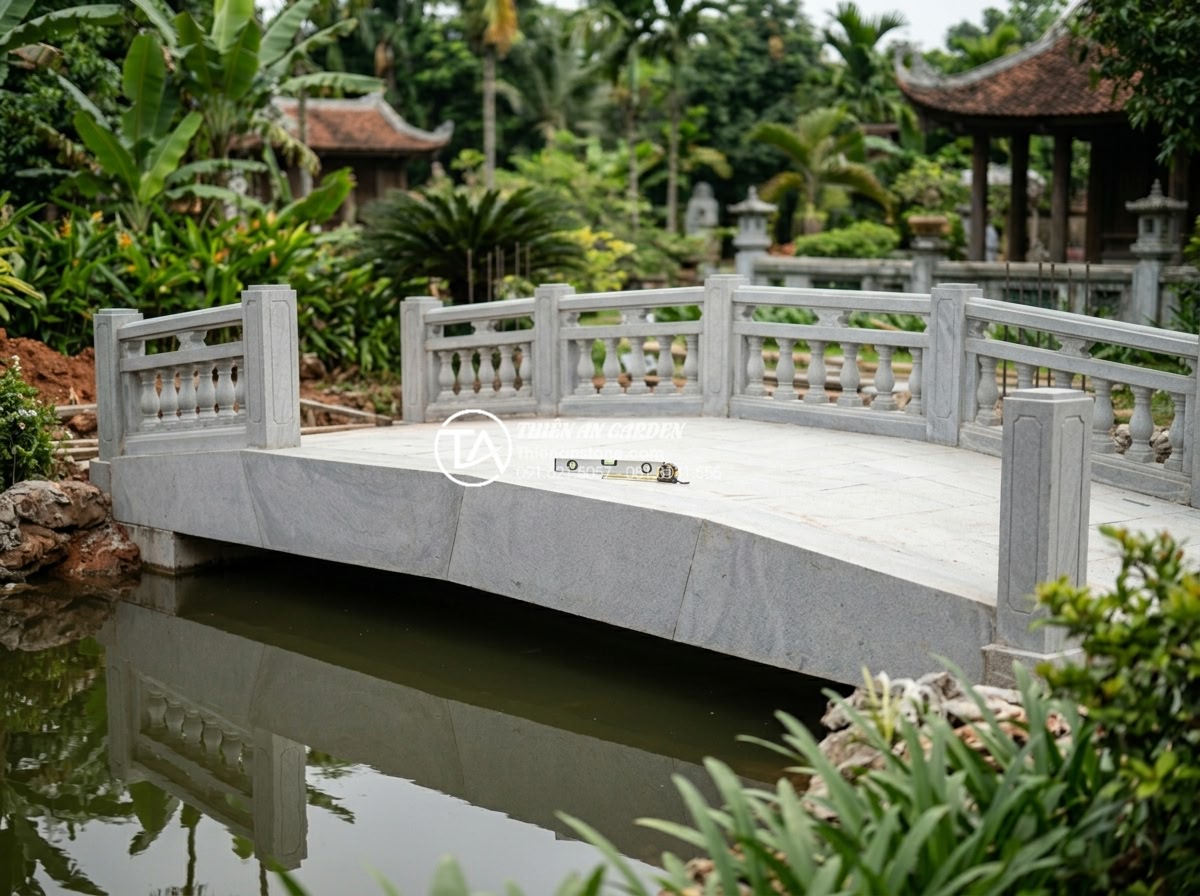 Phân loại các dáng cầu đá phổ biến: Cầu vòm, cầu phẳng và cầu dích dắc - Step-by-step professional installation process of a large natural stone garden b