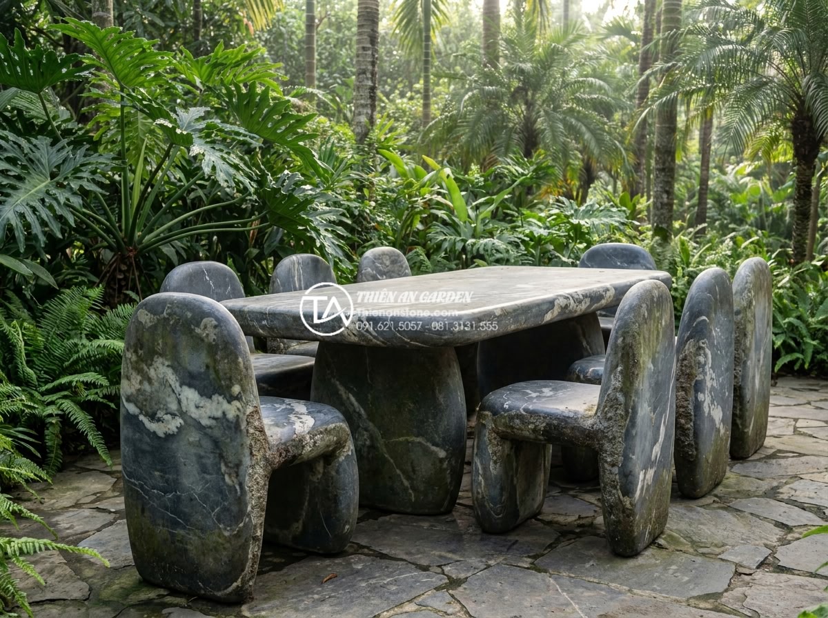 Review thực tế: Sử dụng bàn ghế đá hoa cương sau 10 năm sẽ như thế nào? - Realistic high-resolution photograph of a large granite stone dining table and m